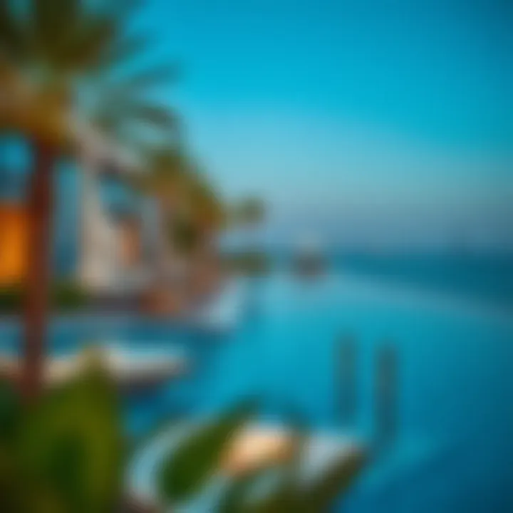 Indulgence at Resorts: Oasis by the Sea Luxurious resort pool overlooking the Arabian Gulf