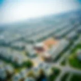 Aerial view of Muhaisnah 4 showcasing residential developments