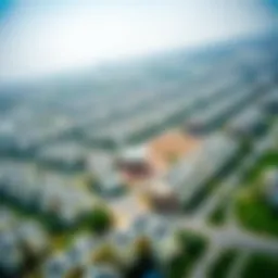 Aerial view of Muhaisnah 4 showcasing residential developments