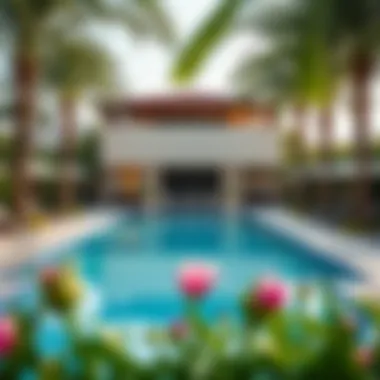 Luxurious swimming pool area surrounded by lush landscaping
