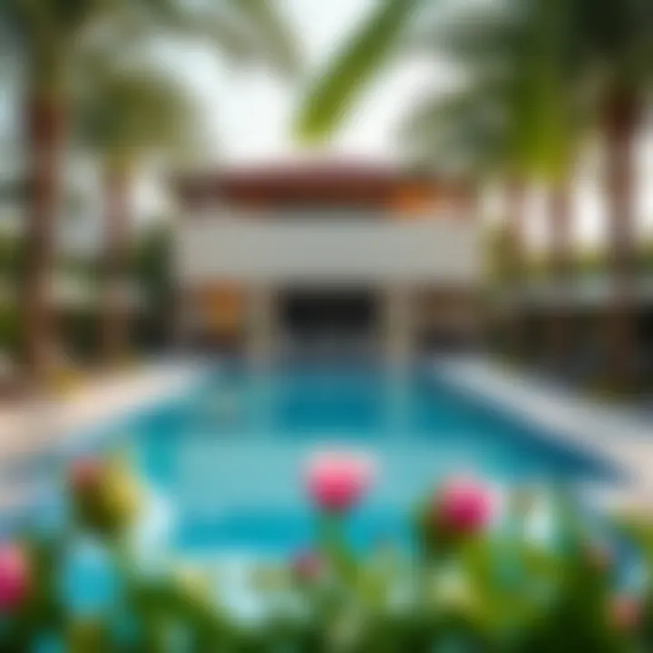 Luxurious swimming pool area surrounded by lush landscaping