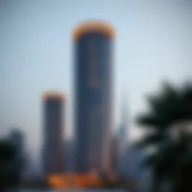 Evening skyline view of the Kaizen Tower illuminated